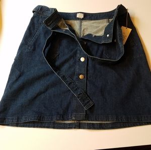 Knee length denim button up skirt.